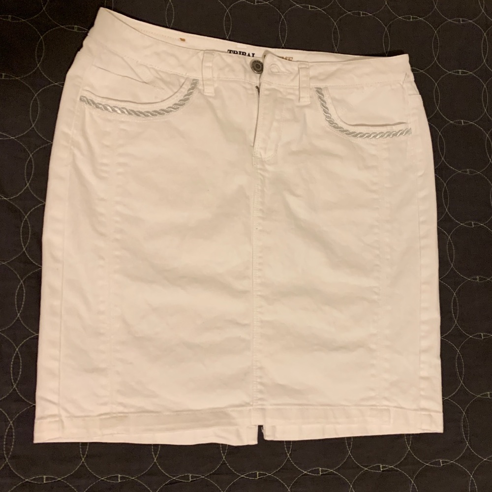 White knee length denim skirt.